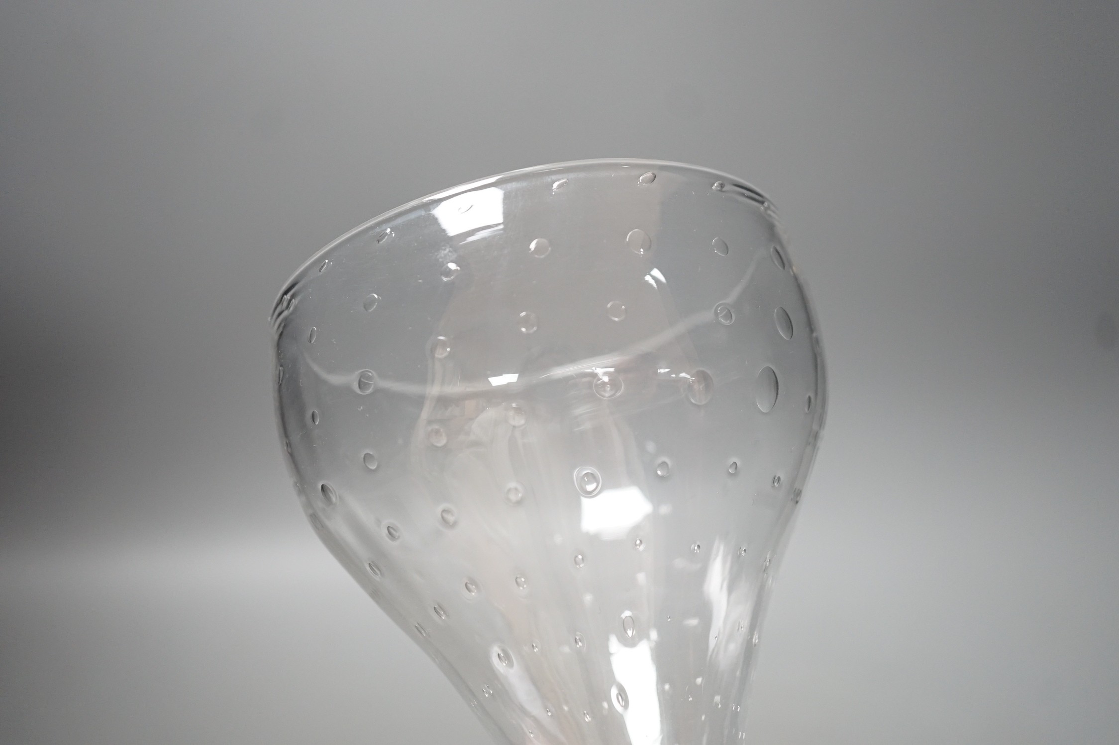 A unusual glass rummer, with a pattern of bubble inclusions to the bowl. 16cm high